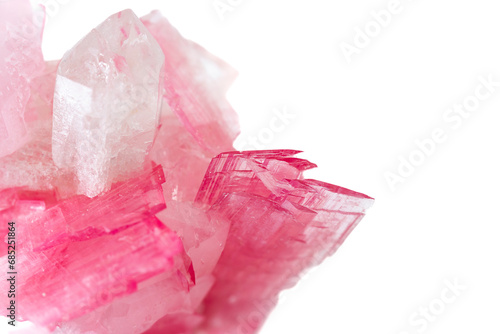 macro close up of natural rubellite (pink tourmaline) mineral cristals on white background photo