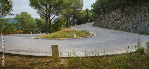 Hairpin turn on an empty mountain road in Croatia