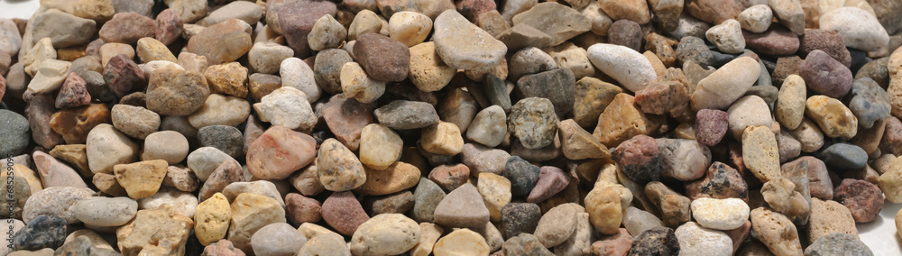 Background of large amount of little dark, brown, red and yellow stones Background of large amount of little dark, brown, red and yellow stones