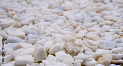 Obraz na plátne Background of large amount of little well polished white stones