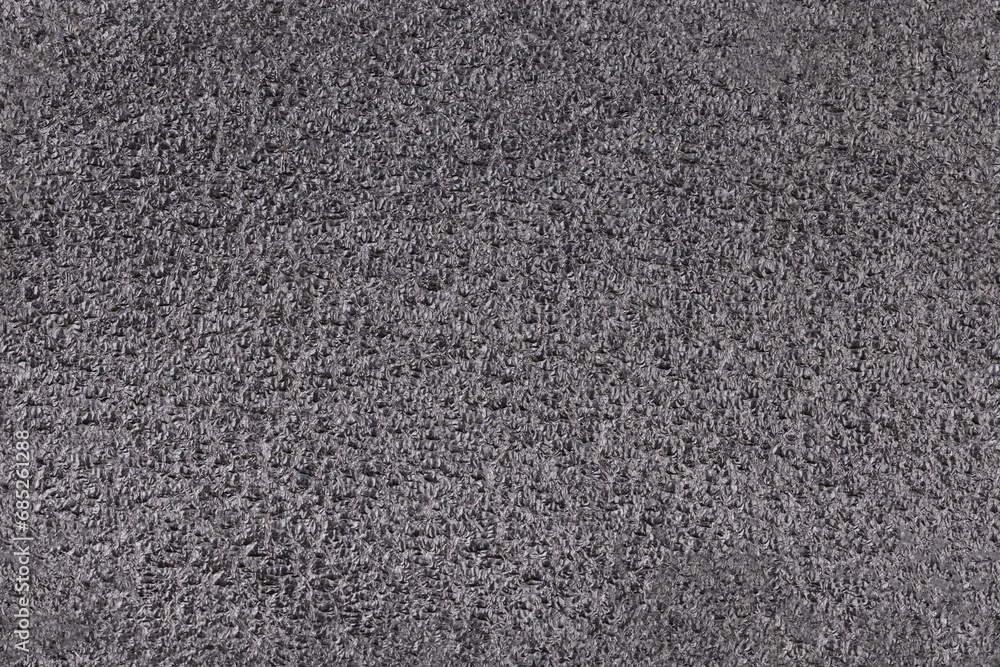 Black high-impact closed-cell polyethylene black foam sheet seamless texture and background. Specifically designed packing material. Black high-impact closed-cell polyethylene black foam sheet seamless texture and background. Specifically designed packing material.