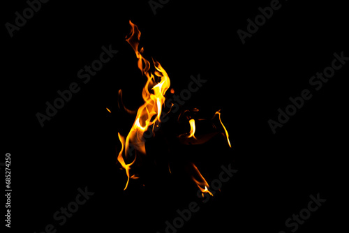 Fire flame texture. Burning material backdrop. Burn effect pattern. Blaze and torch wallpaper. Heat and haze backdrop. © Jozsef