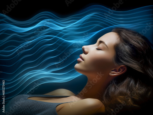 A serene image of a young woman sleeping, her head cradled in transparent waves symbolizing the rhythmic brain activity during sleep photo