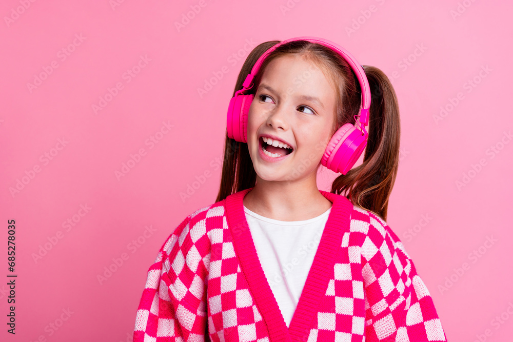 Photo of cute adorable glamour cheerful girl wear stylish clothes look up offer sale discount empty space isolated on pink color background Photo of cute adorable glamour cheerful girl wear stylish clothes look up offer sale discount empty space isolated on pink color background