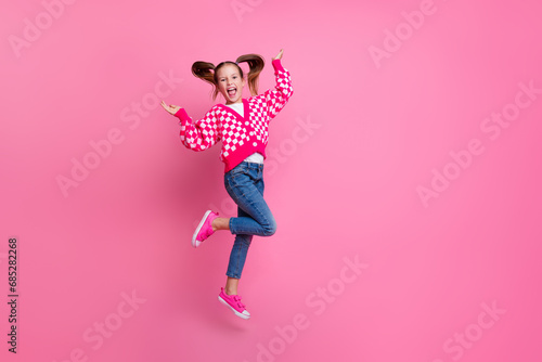 Full length photo of positive optimistic pupil wear stylish outfit rejoice summer holidays empty space isolated on pink color background