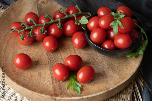 cherry tomatoes on a wooden tray