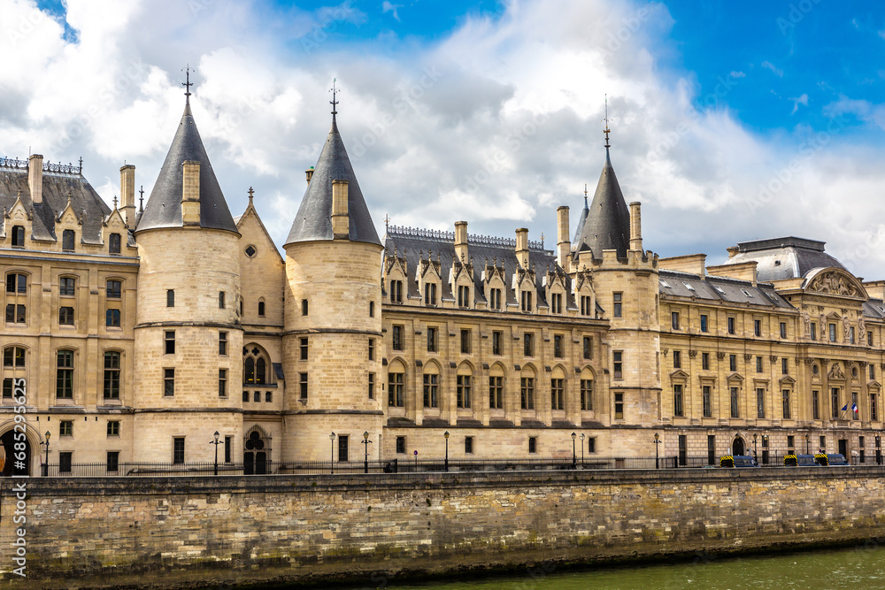 Conciergerie palace and prison and Seine river in Paris, France
