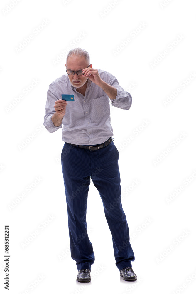 Old businessman holding credit card isolated on white