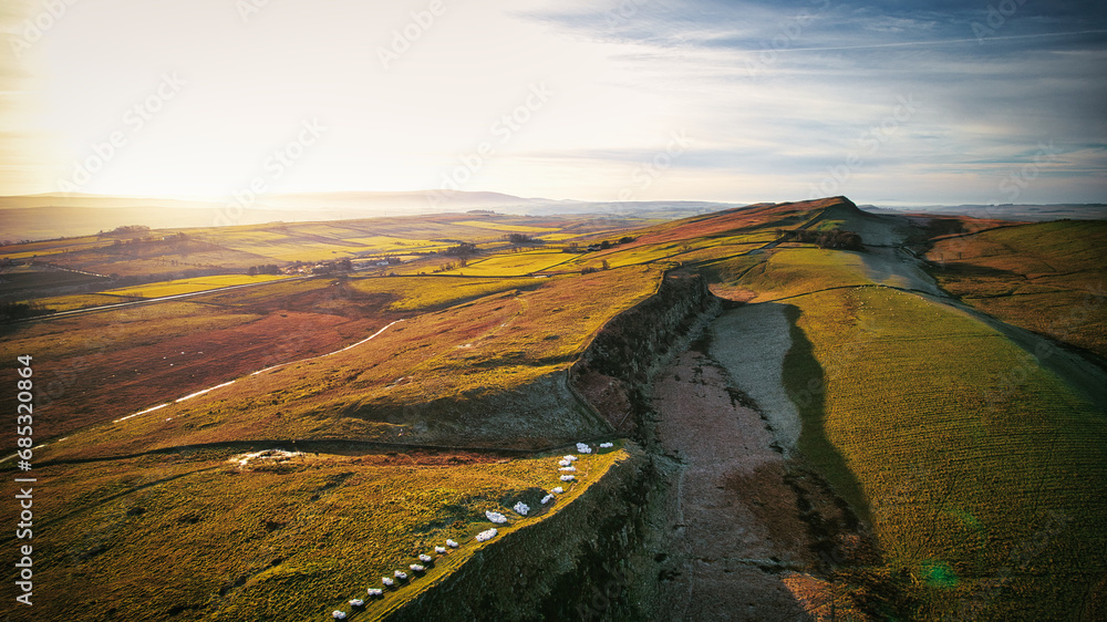Scenic aerial landscape photo of the nature at Sycamore Gap, UK