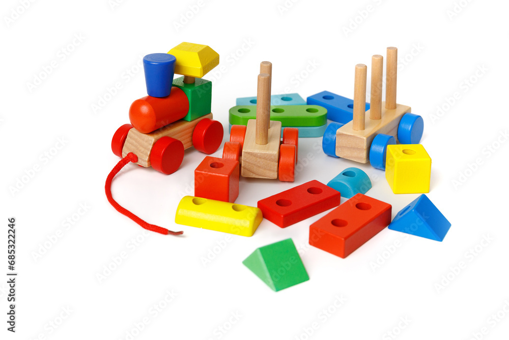 A set of Montessori children's educational toys made from different blocks and puzzles isolated on white background. A set of Montessori children's educational toys made from different blocks and puzzles isolated on white background.