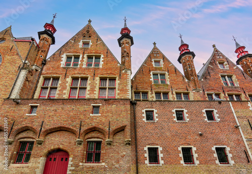 Medieval architecture of old Bruges along Groenerei canal, Belgium photo