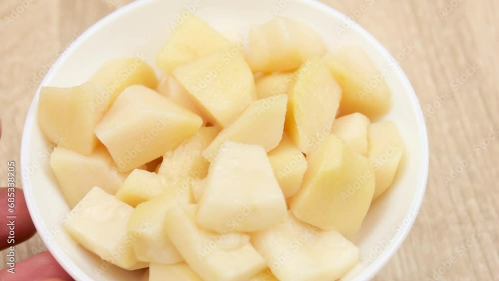 Guava, chopped pieces. Guava fruit in a cup on the table. Guava, chopped pieces. Guava fruit in a cup on the table.