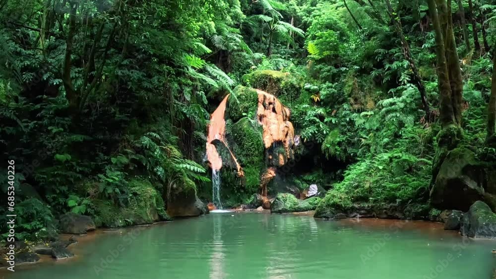 Thermal water at the 'Centro de Interpretação Ambiental da Caldeira Velha' in the middle of the nature, in Azores, Portugal