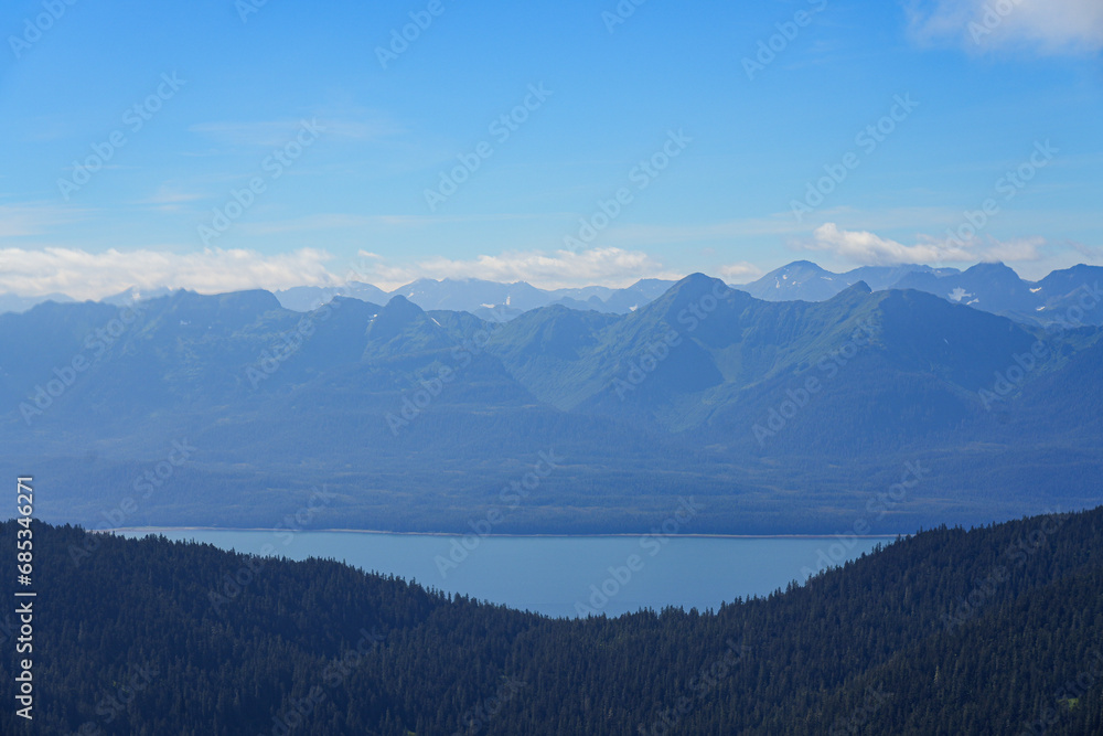 Aerial view of a snow-capped mountain range north of Juneau, Alaska