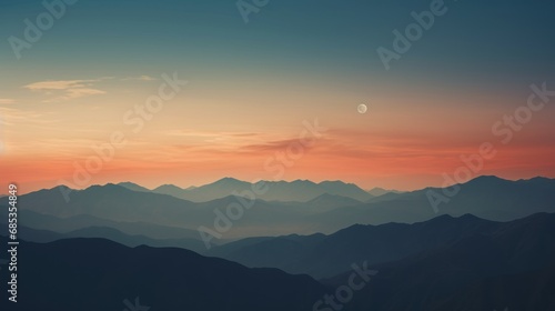  a sunset view of a mountain range with a half moon in the sky and a few clouds in the sky.