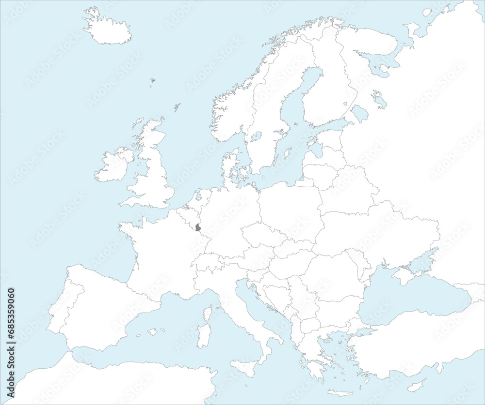 Gray CMYK national map of LUXEMBOURG inside detailed white blank political map of European continent on blue background using Mollweide projection