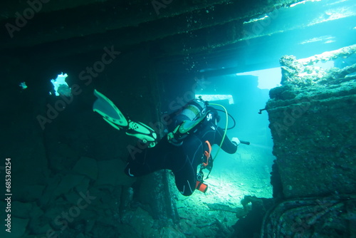 Scuba diver inside the wreck of the Chrisoula K in the Red Sea in Egypt photo