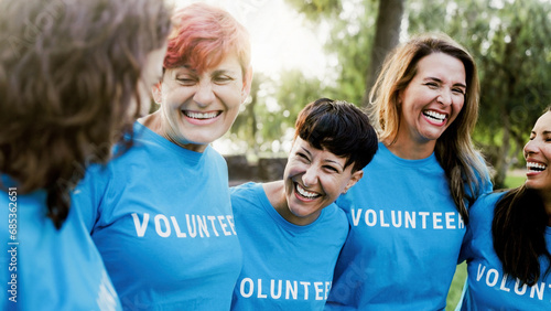 фотографія Diverse group of volunteer people celebrating together outdoors