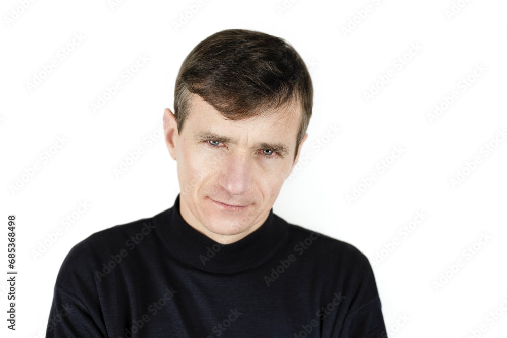 A middle-aged man is tired from constant mental work at the computer, his eyes hurt, they are red, he may have conjunctivitis, he has a headache A middle-aged man is tired from constant mental work at the computer, his eyes hurt, they are red, he may have conjunctivitis, he has a headache