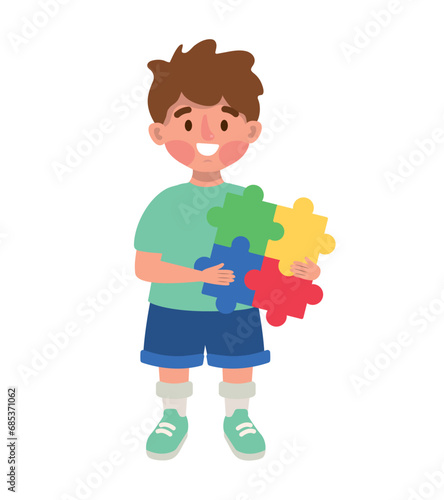 autism boy with puzzles © Gstudio