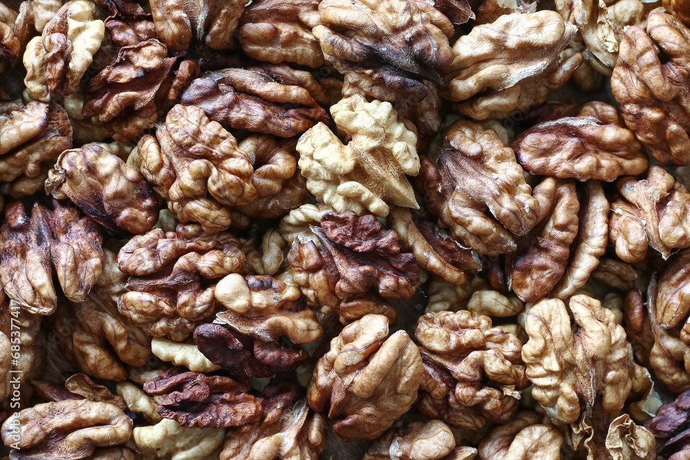 a pile of shelled colorful walnuts a pile of shelled colorful walnuts