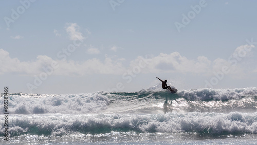 Hawaii Surfer riding wave