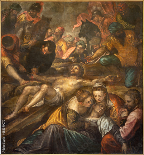 VICENZA, ITALY - NOVEMBER 5, 2023: The painting  Jesus is nailed the the cross in the Catheral by Alessandro Maganza (1587-1589). © Renáta Sedmáková