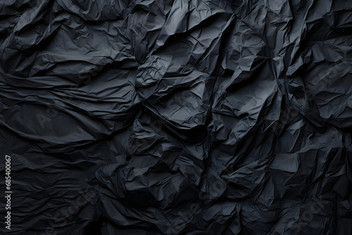 Texture of black blank crumpled paper.
