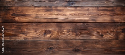 Processed wooden surface in dark brown  rustic background.