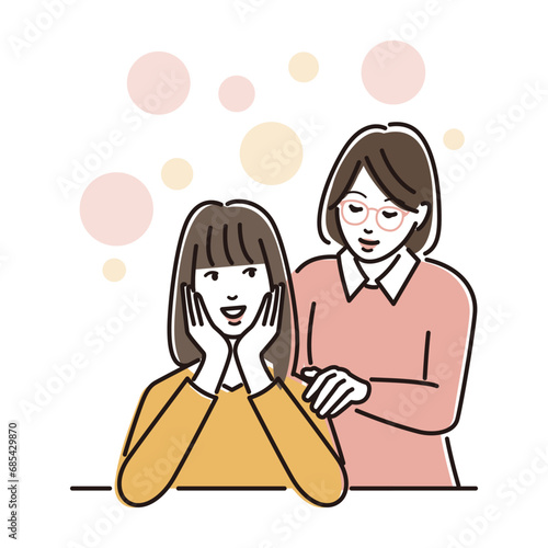 笑顔で寄り添う若い母親と娘