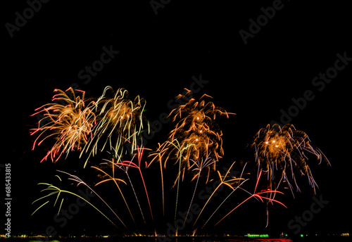 Fireworks show under defocus or blur concepts with isolated black background at night  this celebration is for the International Fireworks Festival in Pattaya on Nov 24-25 in Thailand.