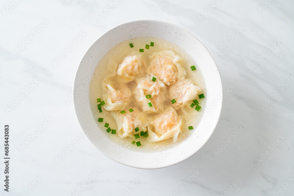 shrimp dumpling soup in white bowl shrimp dumpling soup in white bowl