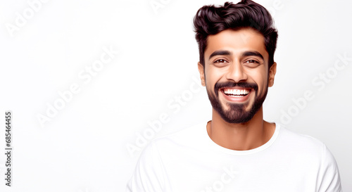 Portrait of a young smiling Indian man with beard isolated on white background. legal AI