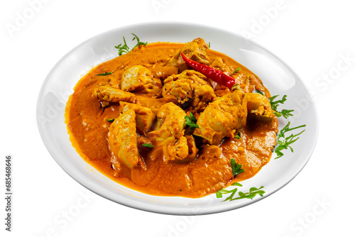 Indian chicken curry on a plate isolated on a transparent background. Generative AI