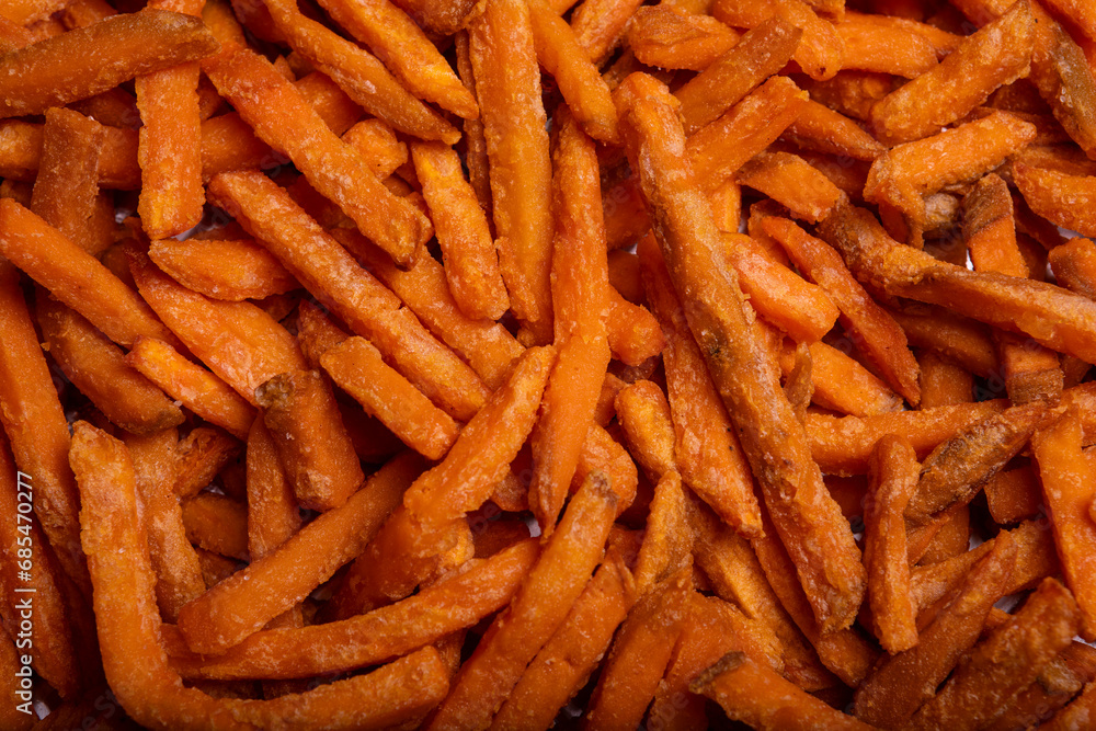 High Angle view of Air fried sweet potato fries Background on a tray