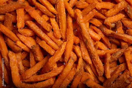 High Angle view of Air fried sweet potato fries Background on a tray