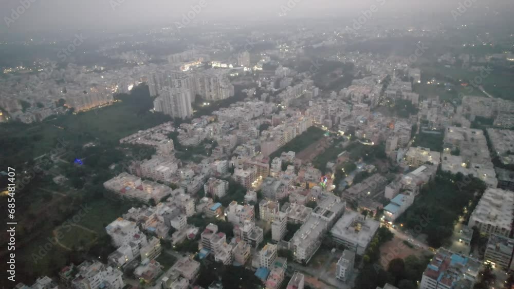 An aerial view of Bengaluru, Karnataka's Electronic City, surrounded by apartment buildings, was taken on a foggy morning in a busy residential neighborhood. The popular area. An aerial view of Bengaluru, Karnataka's Electronic City, surrounded by apartment buildings, was taken on a foggy morning in a busy residential neighborhood. The popular area.