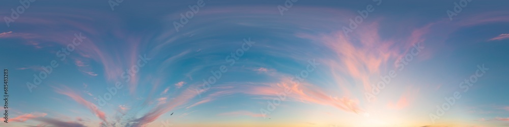 Sunset sky panorama, glowing pink Cirrus clouds, seamless 360 hdr equirectangular, great for virtual reality projects and sky replacement.