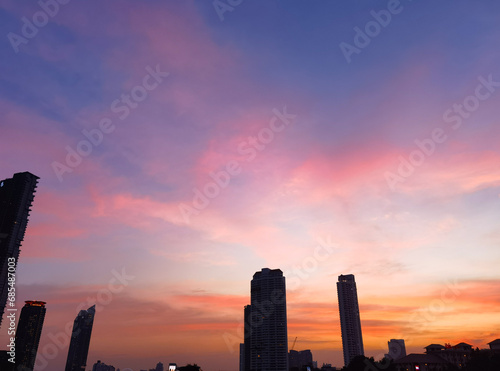 Bangkok, Thailand: Beautiful Landscape of high modern building tower at Chaopraya river in evening with colorful sky at Asiatique The Riverfront travel