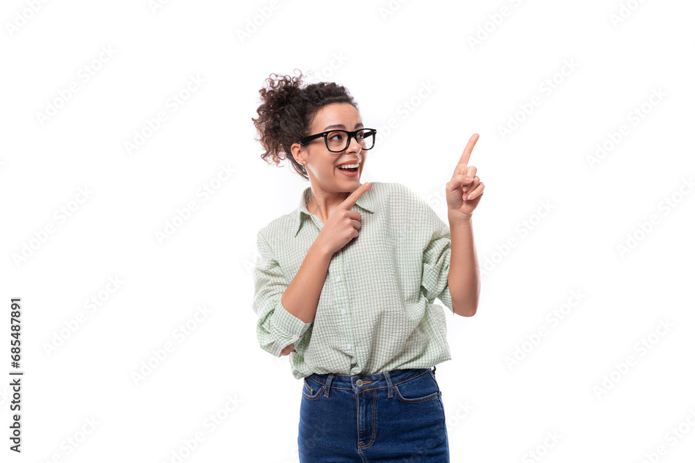 young energetic positive teacher woman with curly black hair dressed in a shirt and jeans young energetic positive teacher woman with curly black hair dressed in a shirt and jeans