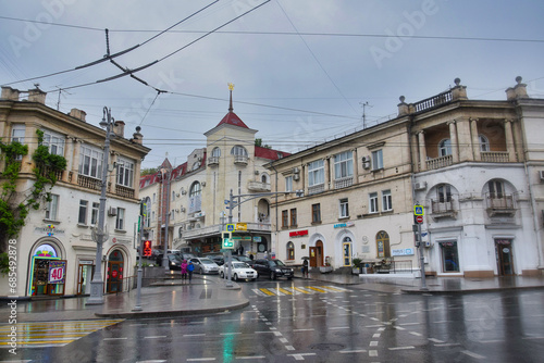 Rainy day on the city square in Sevastopol photo