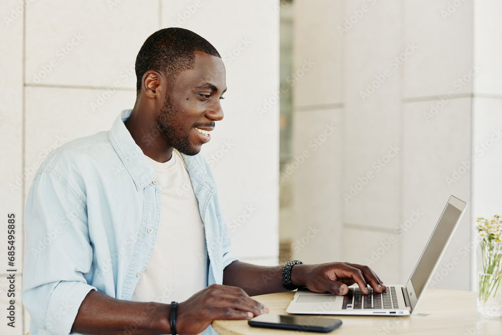 Adult working computer laptop male young technology businessman business office men sitting person Adult working computer laptop male young technology businessman business office men sitting person