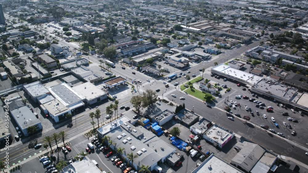 Aerial timelapse of an intersection in Costa Mesa, California with high traffic during the day. Aerial timelapse of an intersection in Costa Mesa, California with high traffic during the day.