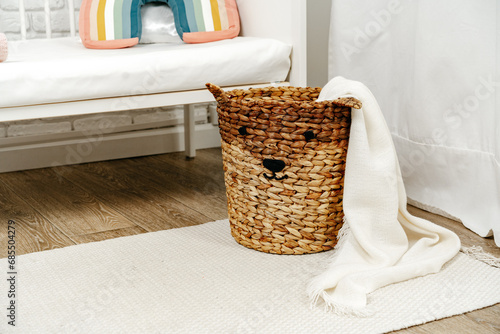 Wicker basket for toys in the children's room