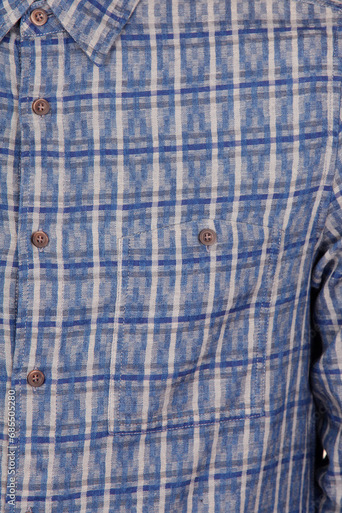 material sample of a stylish men's shirt made of denim material on a white background material sample of a stylish men's shirt made of denim material on a white background
