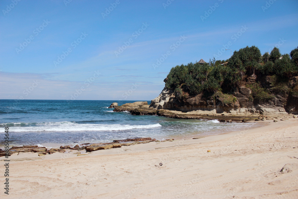 Landscape beach view with wavy white sand on the Klayar Beach, Pacitan, East Java, Indonesia
