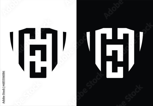 SHIELD-SHAPED VECTOR MONOGRAM DESIGN FORMING THE LETTERS "M" AND "O". BLACK AND WHITE BACKGROUND.