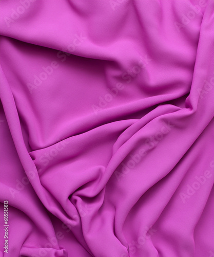 Texture of purple fabric top view. Pink pile fabric with pleats