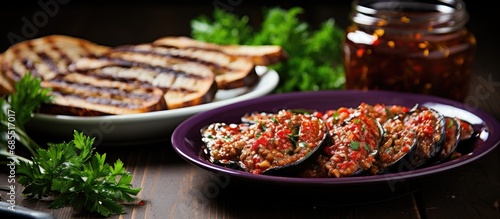Turkish appetizers with pickled eggplant and tomato paste.