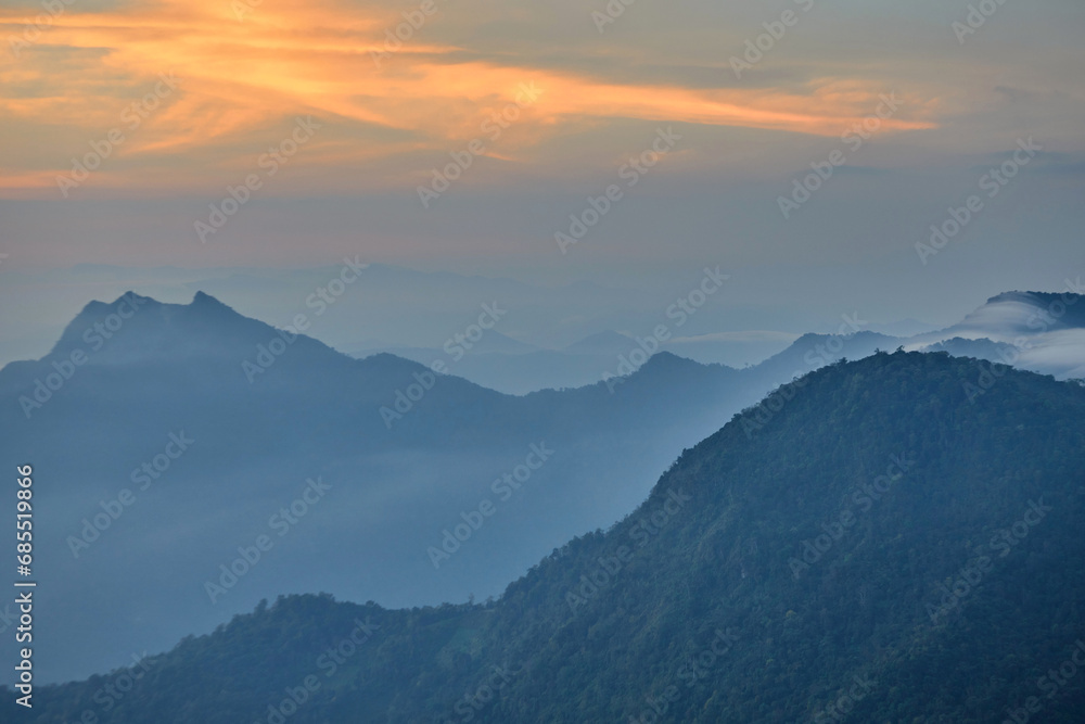 Obraz premium Dramatic sky with morning fog in mountain